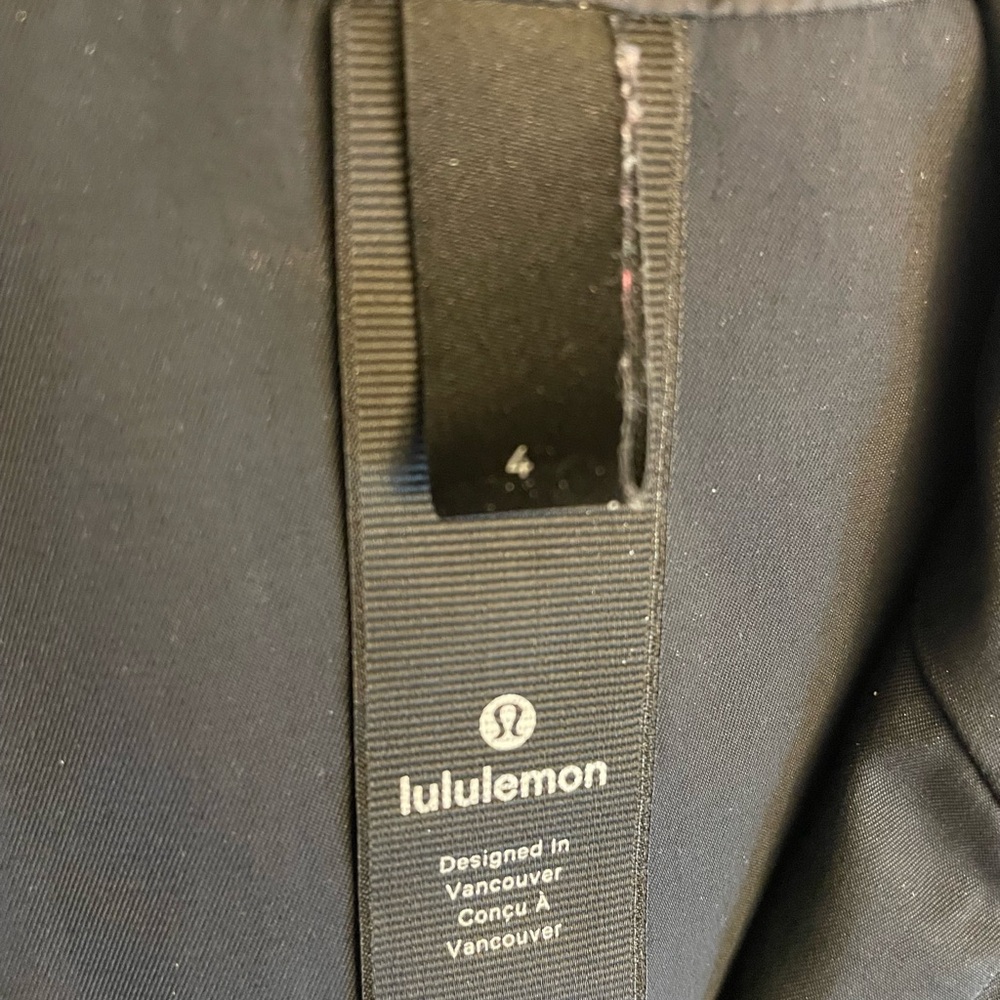 Lululemon Black Hooded Rain Jacket High Low Hem Lightweight Shell Zip Front Sz 4 - Picture 4 of 6